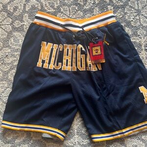NWT university of Michigan sports shorts -size large